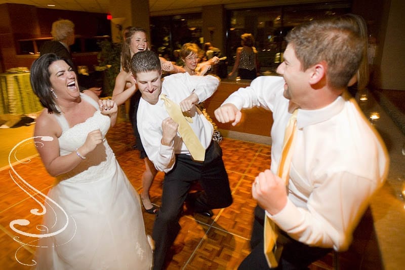 Though their wedding was small, Ty from North Shore Entertainment kept them dancing during the reception.