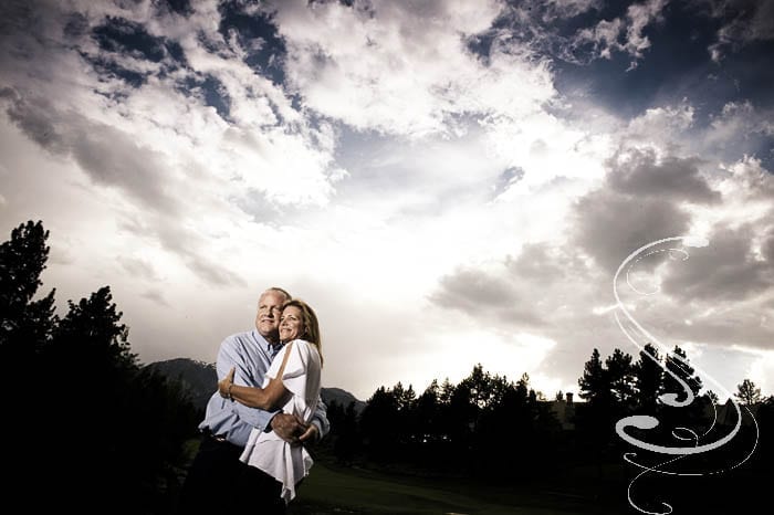 We used a powerfull flash to light the couple and preserve the moody clouds.