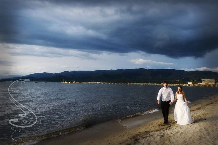 Back at the reception at the Lakefront Wedding Chapel, we had a brief break in the clouds where some beautiful sunlight poked through and Shelly and Andrew were quick to run out for a quick stroll along the beach.