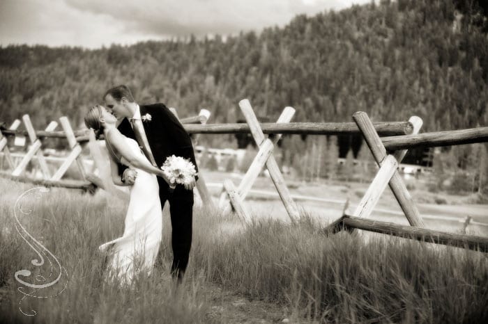 Katie and Warren having a great time during their bridal portrait session along the fence in Squaw Valley.