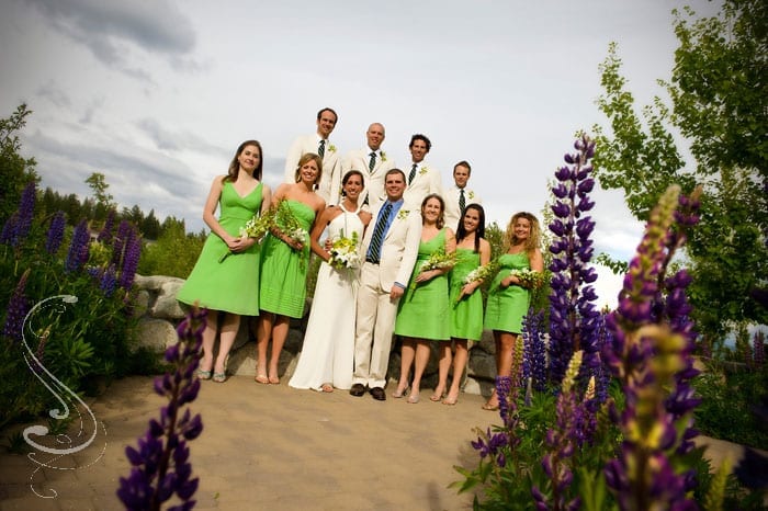 Getting low for this bridal party photograph adds depth by framing the group with the beautiful lupine wildflowers. I always try to give the group shots a little extra pizazz to keep them from looking like people are just standing in a big, long straight line.