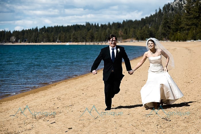 couple on shores of lake tahoe
