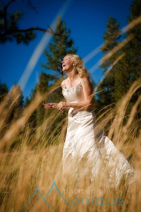 bride in a field of grass at lake tahoe