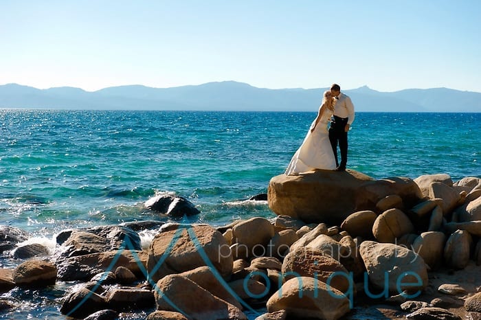 bride and groom picture on shore of lake tahoe