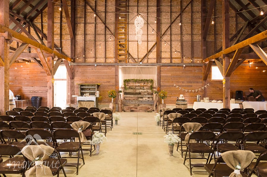 The roomy interior of the Corner Barn at Graeagle can be set up in many different ways. Due to the late October date of this wedding, the couple chose to do both the ceremony and reception indoors.