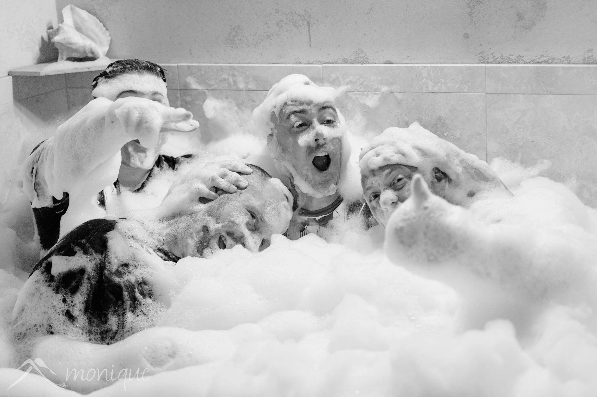 groomsmen in bubble bath