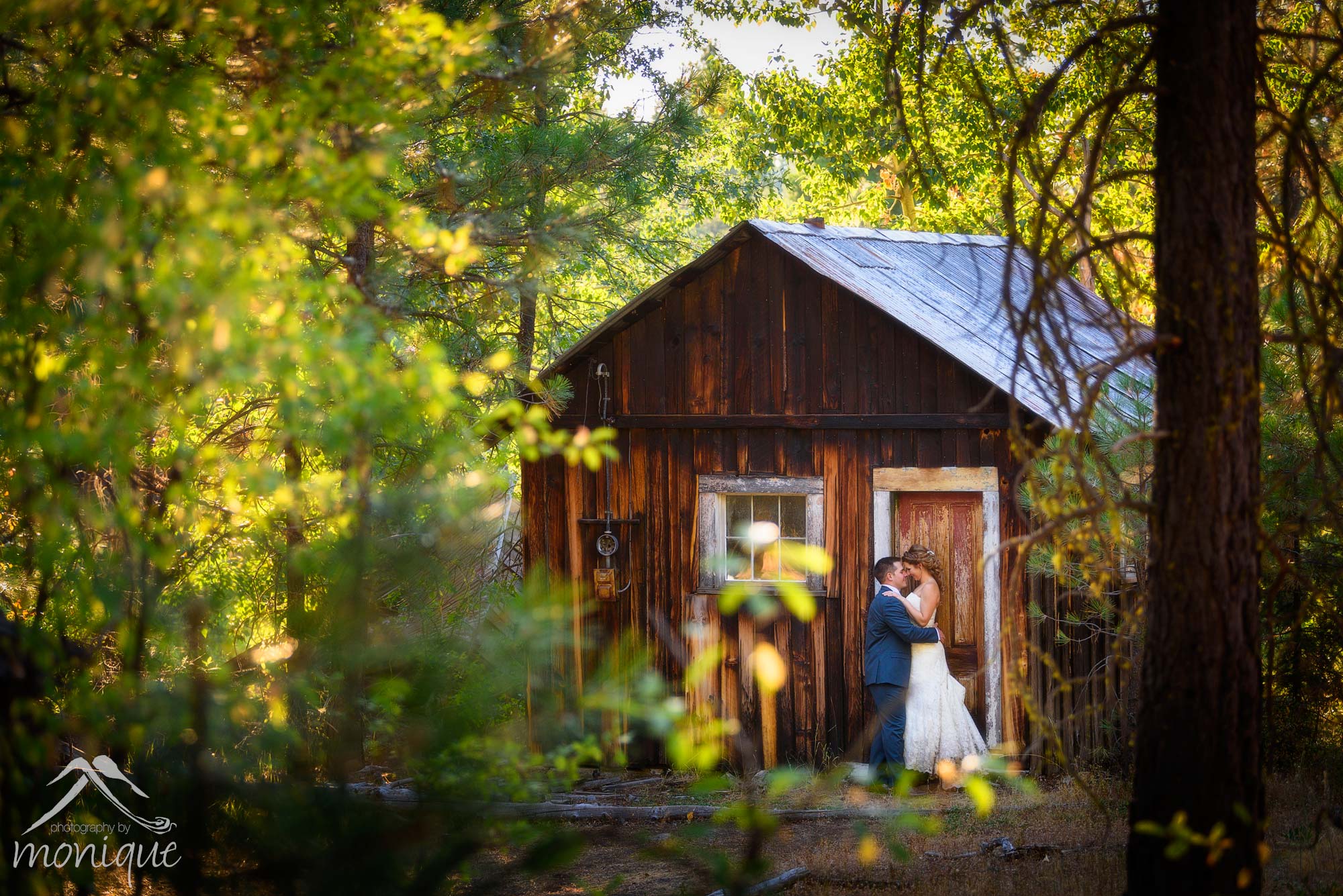 Twenty Mile House wedding photography bride and groom portrait in front of old mining shed