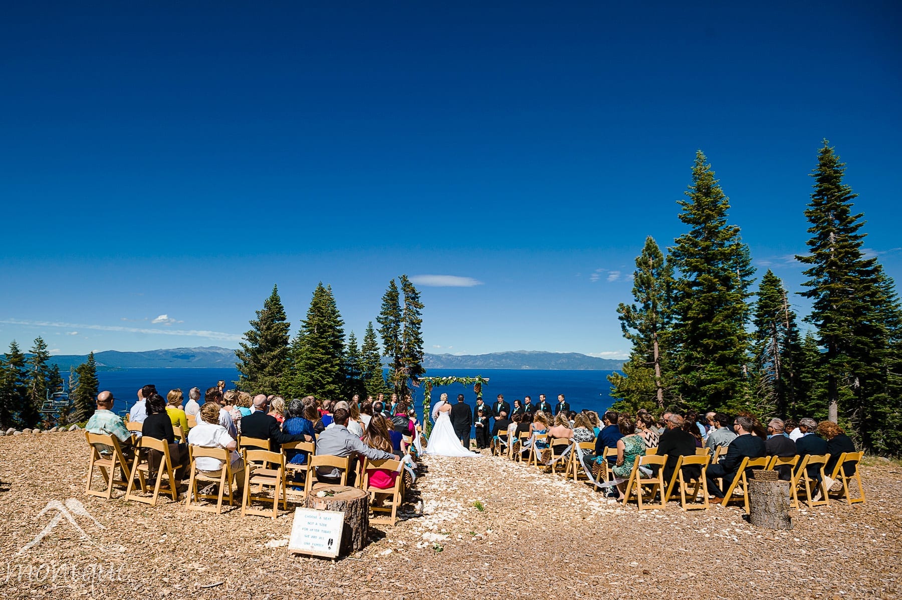 Homewood Mountain Ski Resort wedding photography by Photography by Monique on top of the mountain with Lake Tahoe in the background 