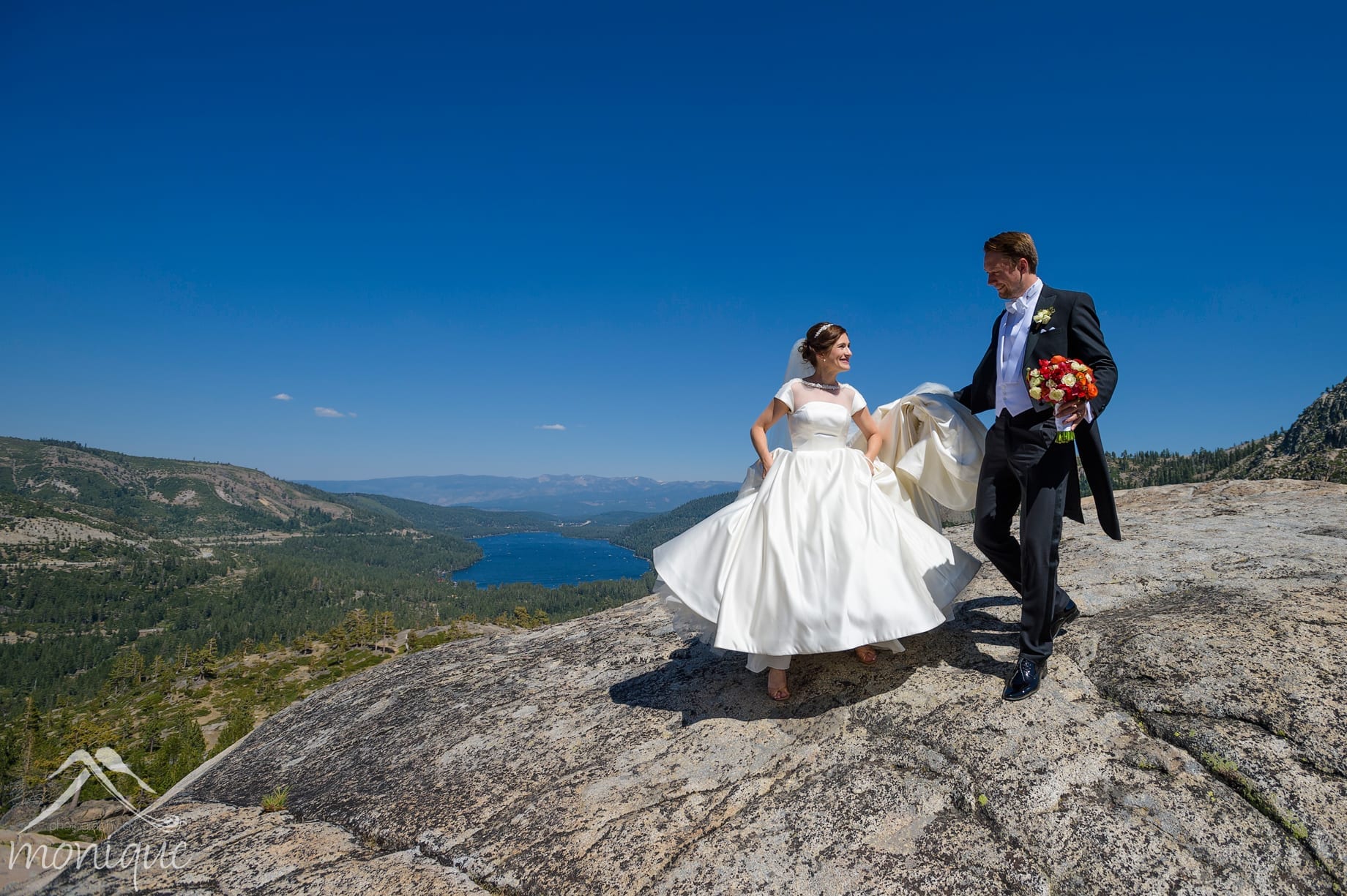 Sugar Bowl ski resort mountain top wedding in Truckee with the bride and groom overlooking Donner Lake by Photography by Monique