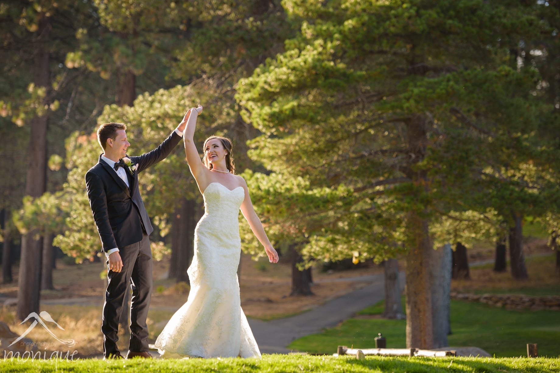 The Lodge at Tahoe Donner wedding photography with a bride and groom practicing their dance on the golf course green by Photography by Monique specializing in documentary style wedding photojournalism