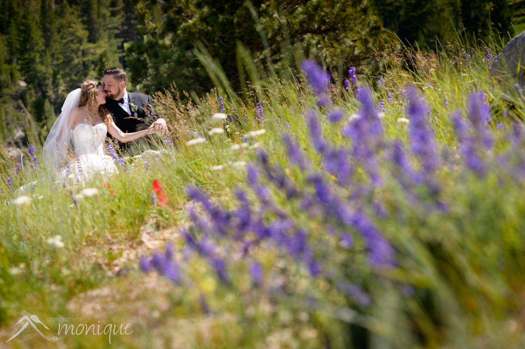 bride and groom with flowers at winters creek lodge