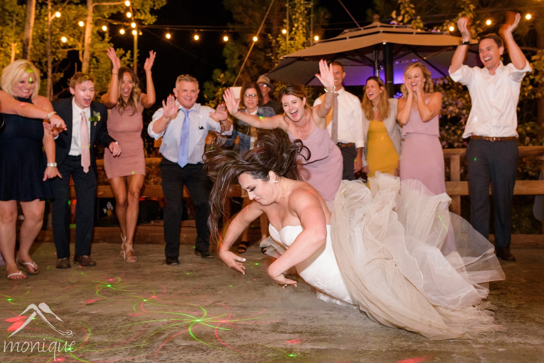 Twenty Mile House wedding photography with the bride doing the Worm on the dance floor in her wedding dress