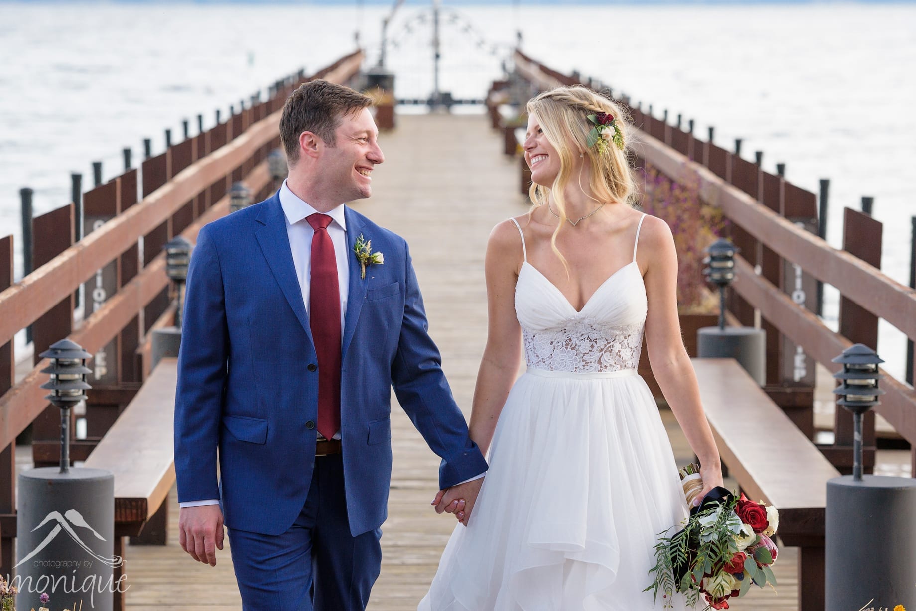 Gar Woods wedding photography with the bride and groom walking on the pier