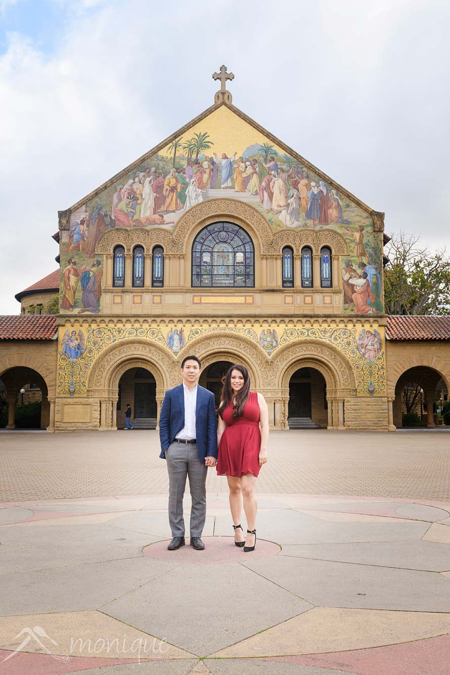 Stanford University engagement session photography with the couple standing in from of the famous Stanford Memorial Church