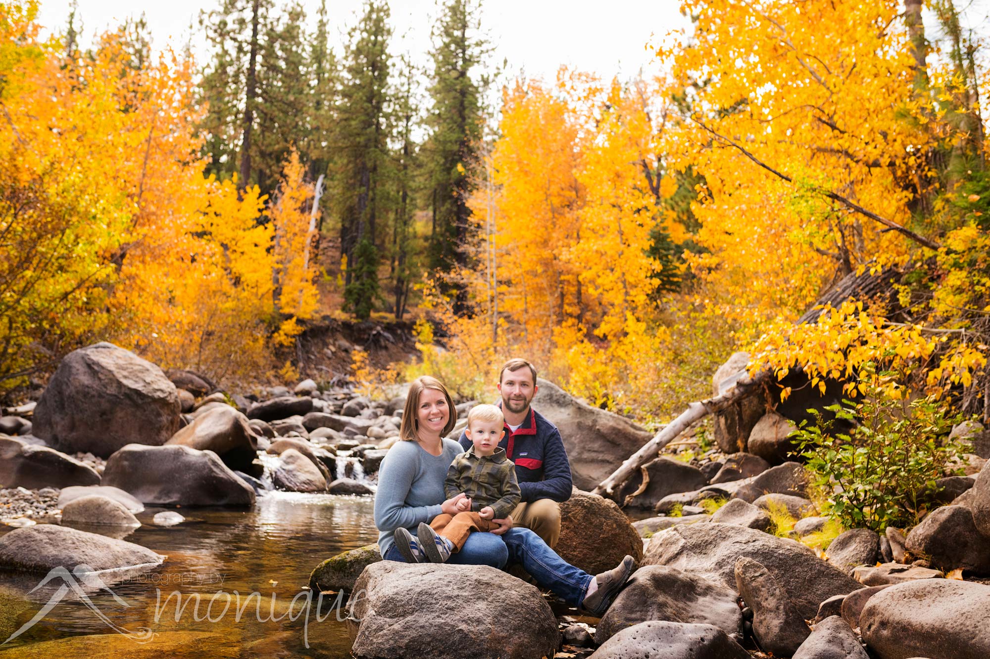 Truckee family photography with beautiful fall colors along a creek