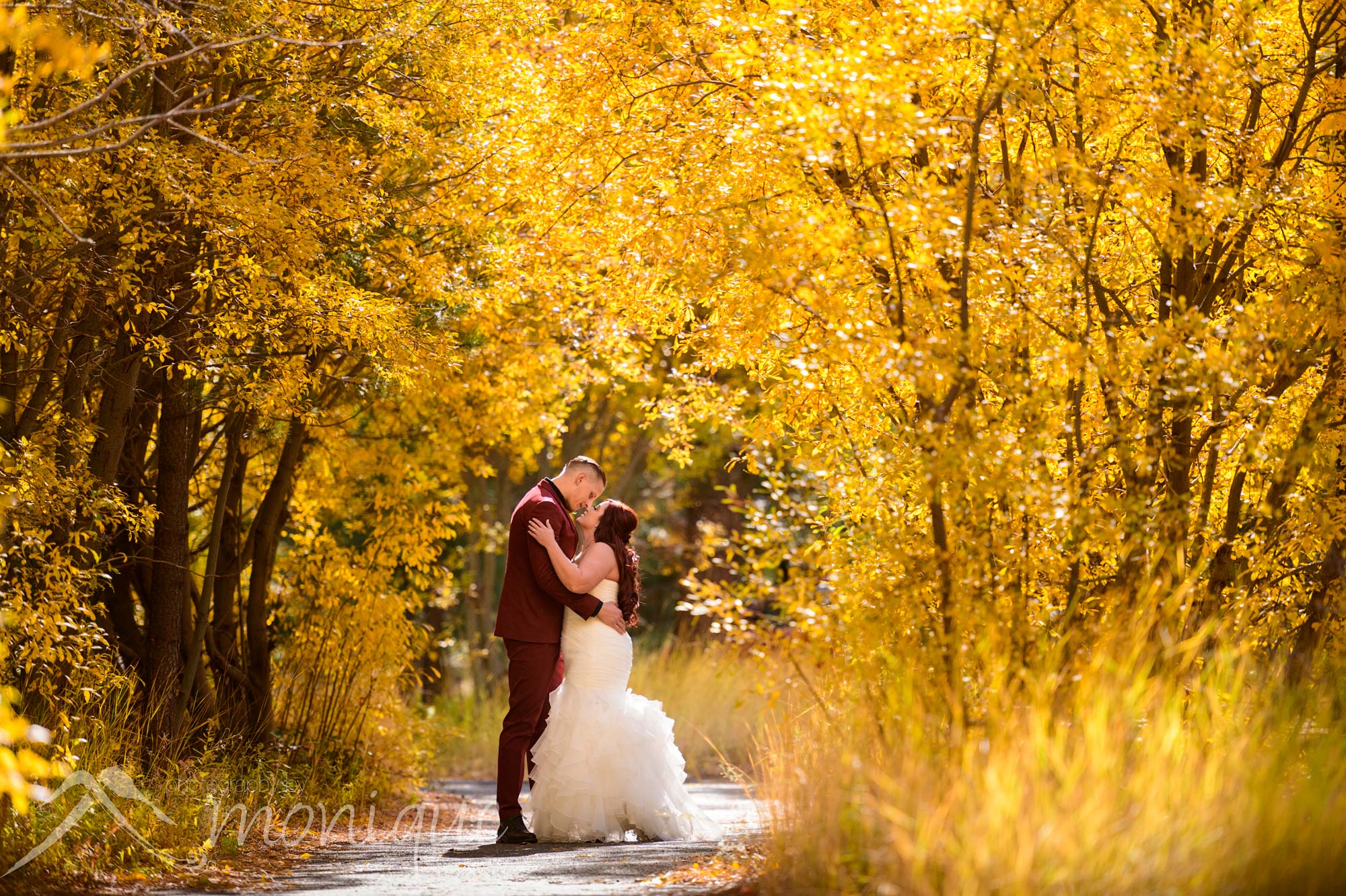 Valhalla Tahoe wedding photography with the fall colors all around the bride and groom