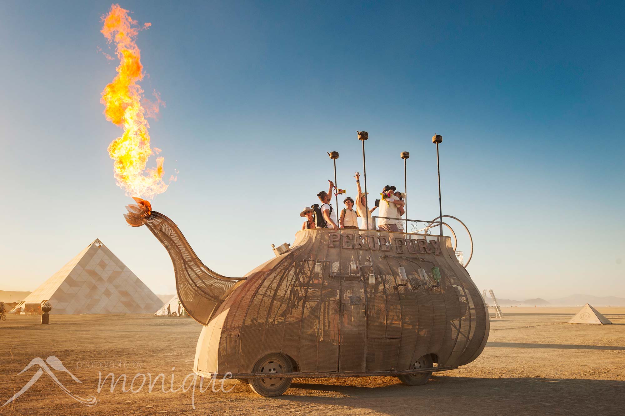 Burning Man wedding photography for Sita Devi and Sunshine, Pekoe Fury tea pot art car, Janet Stone, PlayAlchelist Grand Pyramid